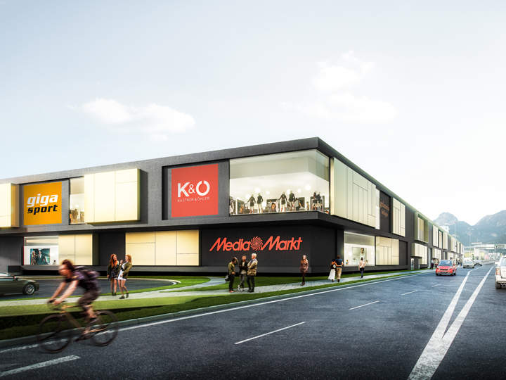 Ein moderner Einkaufskomplex mit Geschäften wie Media Markt, K&Ö und Giga Sport. Auf der Straße sieht man Fußgänger und einen Radfahrer. Das Gebäude hat große Schaufenster und ein elegantes Design mit klarem Himmel im Hintergrund.
