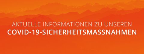 Orangefarbener Hintergrund mit Farbverlauf und schwachen Bergsilhouetten. Der weiße Text lautet: „Aktuelle Informationen zu unseren COVID-19-Sicherheitsmaßnahmen.“.