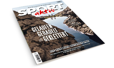 Titelbild der Zeitschrift „Sport Aktiv“ mit einer felsigen Outdoor-Szene mit schmalem Wasserweg. Titel und Ausgabedetails stehen oben, in der Mitte ist prominent „Gelaufen, Gerade, Geklettert“ abgebildet.