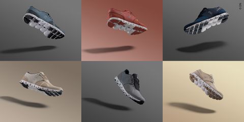 Sechs Paar Sportschuhe werden in einem Raster angezeigt, jedes Paar in einer bestimmten Farbe: Rosa, Marineblau, Grau, Beige, Kombination aus Grau und Schwarz und Hellbraun. Jeder Schuh hat ein einzigartiges, wolkenartiges Außensohlendesign und sie sind vor unterschiedlich farbigen Hintergründen platziert.
