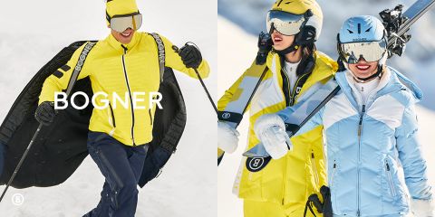 Zwei Skifahrer in bunter Ausrüstung. Links: Person in Gelb mit Schutzbrille, die einen schwarzen Schlitten zieht. Rechts: Zwei Personen in gelben und blauen Jacken, die Skier tragen. Alle tragen Helme und Schutzbrillen. Schneebedeckter Hintergrund mit „BOGNER“ im Text.