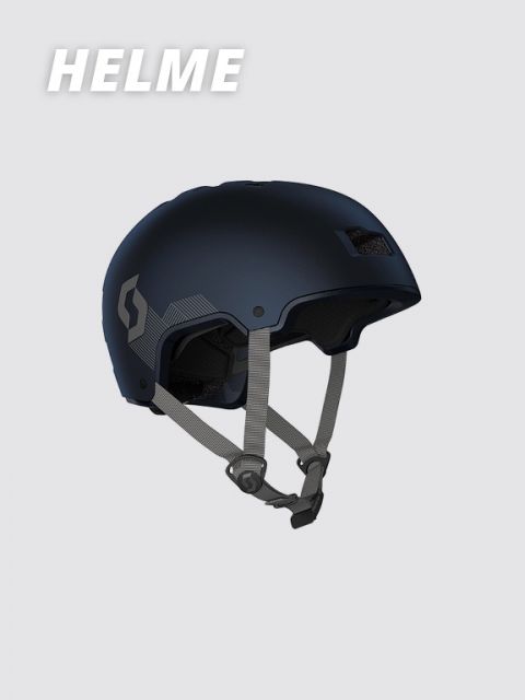 Ein schwarz-grauer Sporthelm mit verstellbarem Kinnriemen und geometrischem Muster an der Seite. In der oberen linken Ecke ist auf hellgrauem Hintergrund das Wort „HELME“ zu sehen.