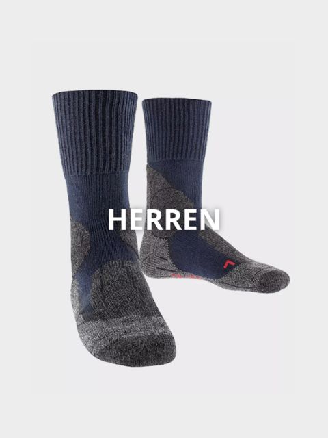 Zwei Paar Wadensocken sind vor hellem Hintergrund abgebildet. Die Socken haben einen dunkelblauen oberen Teil und einen grauen Fußbereich. Quer über das Bild steht in weißer Schrift „HERREN“.