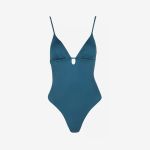 Einteiliger Badeanzug in Petrol mit dünnen Trägern, tiefem V-Ausschnitt und kleinem Ausschnitt unterhalb der Büste.