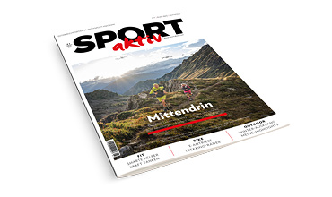 Titelbild der Zeitschrift "Sport aktiv" mit zwei Personen, die bei Sonnenuntergang auf einem Bergpfad laufen, und der Überschrift "Mittendrin".