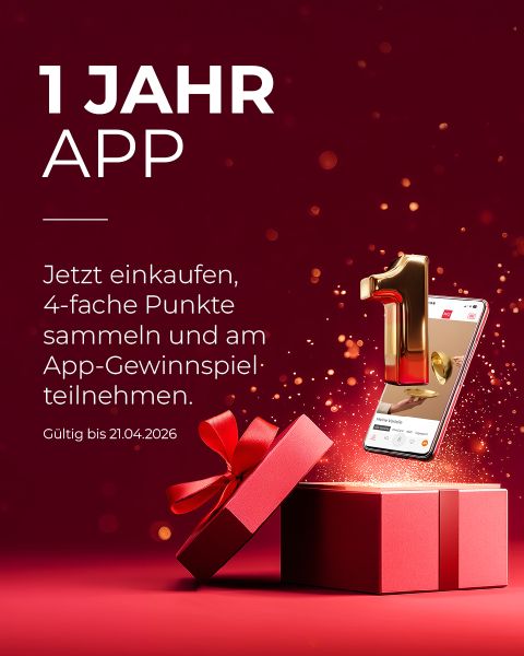 Eine goldene Zahl 1 taucht aus einem Smartphone auf, daneben eine rote Geschenkbox mit einer Schleife. Der deutsche Text wirbt für ein 1-jähriges App-Jubiläum und eine Belohnungsaktion.