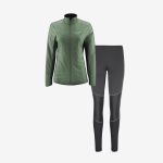 Grüne Jacke mit Reißverschluss und schwarze Sportleggings mit grauen Kniepatches, präsentiert vor einem schlichten weißen Hintergrund.