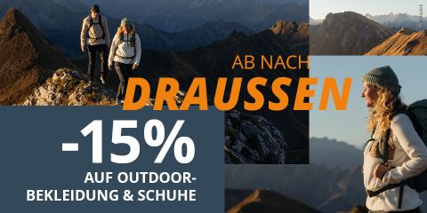 Zwei Wanderer auf einem Bergpfad mit dem Text: Ab nach draußen. – 15 % Rabatt auf Outdoor-Bekleidung und -Schuhe.